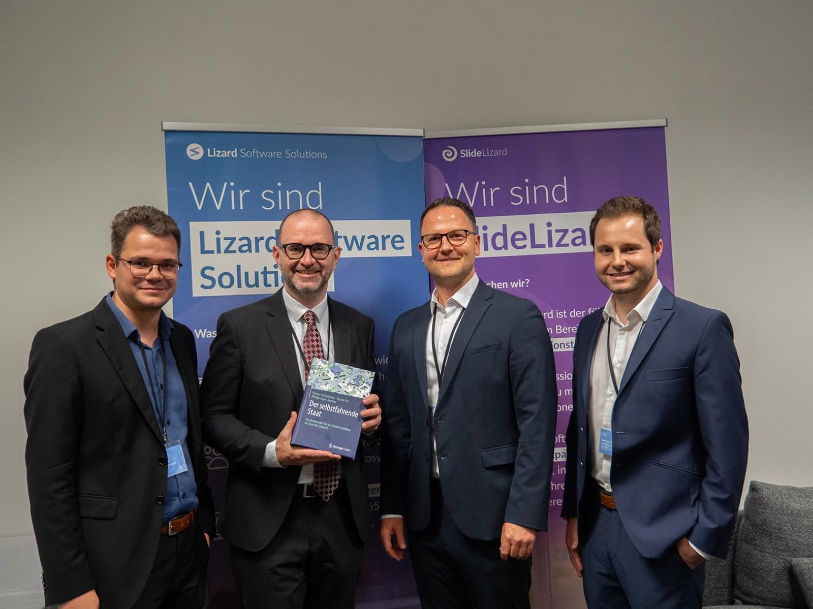 Wine & Business 2024 group photo with book